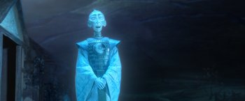 Movie still from “Kubo and the Two Strings” (2016), directed by Travis Knight – A paper mache statue of a man in a blue robe; Medium shot, Over the shoulder angle