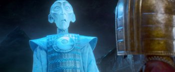 Movie still from “Kubo and the Two Strings” (2016), directed by Travis Knight – An image of an alien in a blue suit; Medium shot, Low angle