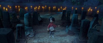 Movie still from “Kubo and the Two Strings” (2016), directed by Travis Knight – A girl is holding a violin in front of a lake; Wide shot, High angle