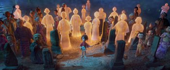 Movie still from “Kubo and the Two Strings” (2016), directed by Travis Knight – A group of people standing in a circle with lights on them; Wide shot, High angle