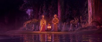 Movie still from “Kubo and the Two Strings” (2016), directed by Travis Knight – A group of people standing next to a body of water at night; Wide shot, Low angle