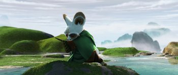 Movie still from “Kung Fu Panda 2” (2011), directed by Jennifer Yuh Nelson – An animated creature is sitting on a rock; Wide shot, High angle