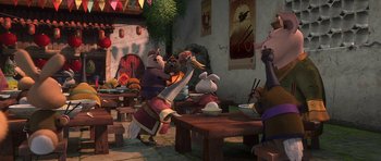 Movie still from “Kung Fu Panda 2” (2011), directed by Jennifer Yuh Nelson – A group of people sitting around a table; Wide shot, High angle
