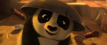 Movie still from “Kung Fu Panda 2” (2011), directed by Jennifer Yuh Nelson – A panda bear with a hat on; Close Up shot, High angle