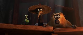 Movie still from “Kung Fu Panda 2” (2011), directed by Jennifer Yuh Nelson – A group of cartoon characters sitting next to each other on a bench; Close Up shot, Low angle