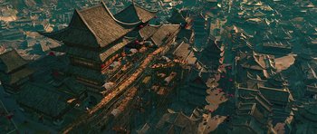 Movie still from “Kung Fu Panda 2” (2011), directed by Jennifer Yuh Nelson – An aerial view of an asian city with many buildings; Extreme Wide shot, Overhead angle