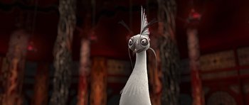 Movie still from “Kung Fu Panda 2” (2011), directed by Jennifer Yuh Nelson – A white bird with long black feathers on it's head; Close Up shot, Low angle