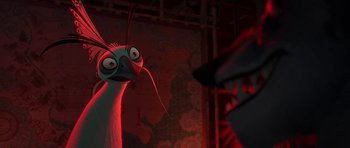 Movie still from “Kung Fu Panda 2” (2011), directed by Jennifer Yuh Nelson – A bird is standing in the middle of a room; Close Up shot, Over the shoulder angle
