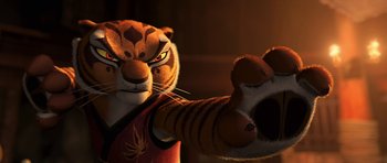 Movie still from “Kung Fu Panda 2” (2011), directed by Jennifer Yuh Nelson – A stuffed tiger is fighting with a stuffed animal tiger; Close Up shot, Low angle