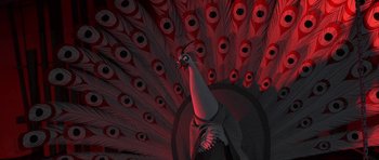 Movie still from “Kung Fu Panda 2” (2011), directed by Jennifer Yuh Nelson – A bird is standing in front of a peacock pattern; Close Up shot, Low angle