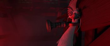 Movie still from “Kung Fu Panda 2” (2011), directed by Jennifer Yuh Nelson – A white bird's head with a red background; Close Up shot, Over the shoulder angle