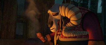 Movie still from “Kung Fu Panda 2” (2011), directed by Jennifer Yuh Nelson – A sheep is sitting on a chair with smoke coming out of its mouth; Close Up shot, Over the shoulder angle