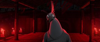 Movie still from “Kung Fu Panda 2” (2011), directed by Jennifer Yuh Nelson – An image of an animated bird in a dark place; Close Up shot, High angle