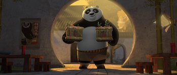 Movie still from “Kung Fu Panda 2” (2011), directed by Jennifer Yuh Nelson – A panda bear holding two baskets; Wide shot, Low angle