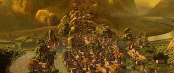 Movie still from “Kung Fu Panda 2” (2011), directed by Jennifer Yuh Nelson – An aerial view of a town with a river and mountains in the background; Extreme Wide shot, High angle