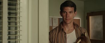 Movie still from “Labor Day” (2013), directed by Jason Reitman – A man standing in front of a wall; Close Up shot, Over the shoulder angle