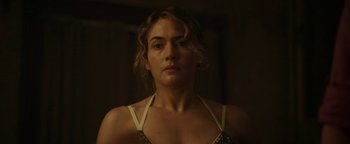 Movie still from “Labor Day” (2013), directed by Jason Reitman – A person wearing a bra; Close Up shot, Low angle