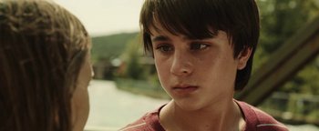Movie still from “Labor Day” (2013), directed by Jason Reitman – A young boy's face; Close Up shot, Low angle