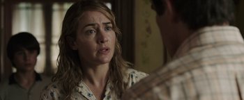 Movie still from “Labor Day” (2013), directed by Jason Reitman – A person talking to another person; Close Up shot, Over the shoulder angle