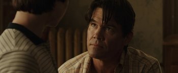 Movie still from “Labor Day” (2013), directed by Jason Reitman – A person looking at the camera; Close Up shot, Over the shoulder angle