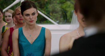 Movie still from “Laggies” (2014), directed by Lynn Shelton – A woman in a blue dress looking at another woman in a blue dress; Close Up shot, Over the shoulder angle
