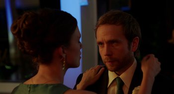 Movie still from “Laggies” (2014), directed by Lynn Shelton – A man and a woman looking at each other in a mirror; Close Up shot, Over the shoulder angle