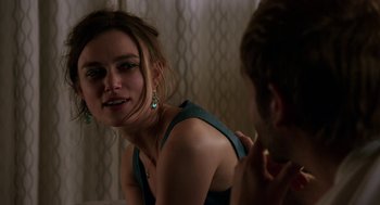Movie still from “Laggies” (2014), directed by Lynn Shelton – A woman sitting in front of a man in front of a mirror; Close Up shot, Over the shoulder angle
