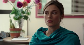 Movie still from “Laggies” (2014), directed by Lynn Shelton – A beautiful woman with a blue shawl around her neck; Close Up shot, Over the shoulder angle