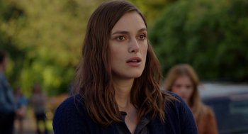 Movie still from “Laggies” (2014), directed by Lynn Shelton – A person with long brown hair; Close Up shot, Over the shoulder angle