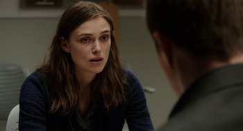 Movie still from “Laggies” (2014), directed by Lynn Shelton – A woman sitting in front of a man in front of a mirror; Close Up shot, Over the shoulder angle