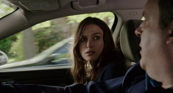 Movie still from “Laggies” (2014), directed by Lynn Shelton – A woman sitting in the passenger seat of a car; Close Up shot, Over the shoulder angle