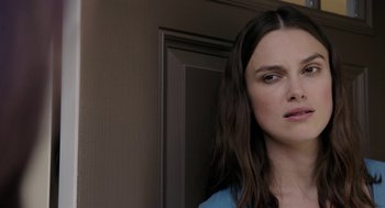 Movie still from “Laggies” (2014), directed by Lynn Shelton – A person standing in front of a door; Close Up shot, Over the shoulder angle