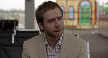 Movie still from “Laggies” (2014), directed by Lynn Shelton – A person wearing a suit and tie; Close Up shot, Over the shoulder angle