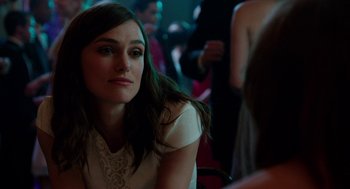 Movie still from “Laggies” (2014), directed by Lynn Shelton – A person sitting at a table; Close Up shot, Over the shoulder angle