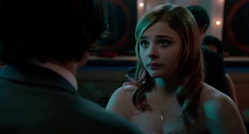 Movie still from “Laggies” (2014), directed by Lynn Shelton – A young woman looking at a young man in a suit; Close Up shot, Over the shoulder angle