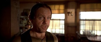 Movie still from “Last Man Standing” (1996), directed by Walter Hill – A person with a beard; Close Up shot, Low angle