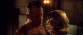 Movie still from “Last Man Standing” (1996), directed by Walter Hill – A man and a woman face to face; Close Up shot, Over the shoulder angle