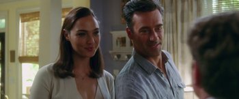 Movie still from “Keeping Up with the Joneses” (2016), directed by Greg Mottola – Gal gadot and hugh jackman in a scene from ' wonder woman; Close Up shot, Over the shoulder angle