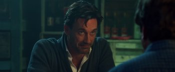 Movie still from “Keeping Up with the Joneses” (2016), directed by Greg Mottola – A person sitting in a room; Close Up shot, Over the shoulder angle