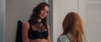 Movie still from “Keeping Up with the Joneses” (2016), directed by Greg Mottola – A woman looking at herself in the mirror; Medium shot, Over the shoulder angle