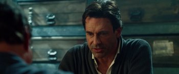 Movie still from “Keeping Up with the Joneses” (2016), directed by Greg Mottola – A person wearing a sweater; Close Up shot, Over the shoulder angle