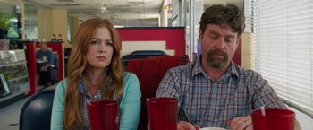 Movie still from “Keeping Up with the Joneses” (2016), directed by Greg Mottola – A man and a woman sitting next to each other; Close Up shot, Over the shoulder angle