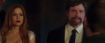 Movie still from “Keeping Up with the Joneses” (2016), directed by Greg Mottola – A man and a woman standing next to each other; Close Up shot, Over the shoulder angle