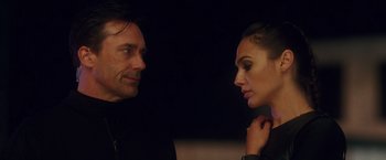 Movie still from “Keeping Up with the Joneses” (2016), directed by Greg Mottola – A man and a woman looking at one another; Close Up shot, Over the shoulder angle