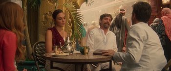 Movie still from “Keeping Up with the Joneses” (2016), directed by Greg Mottola – A man and a woman sitting at a table; Medium shot, Over the shoulder angle