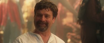 Movie still from “Keeping Up with the Joneses” (2016), directed by Greg Mottola – A person wearing a white shirt; Close Up shot, Over the shoulder angle