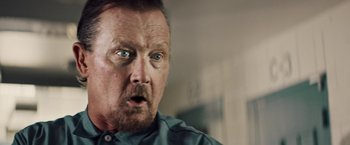 Movie still from “The Last Rampage” (2017), directed by Dwight H. Little – A person with his mouth wide open; Close Up shot, Low angle