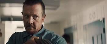 Movie still from “The Last Rampage” (2017), directed by Dwight H. Little – A person with a tie; Close Up shot, Over the shoulder angle