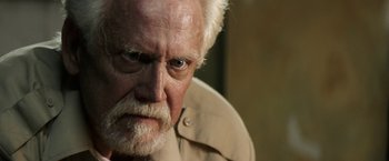 Movie still from “The Last Rampage” (2017), directed by Dwight H. Little – An old man with a white beard and a white mustache; Close Up shot, Low angle