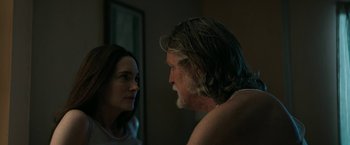 Movie still from “The Last Rampage” (2017), directed by Dwight H. Little – A man and a woman are talking in a room; Close Up shot, Over the shoulder angle